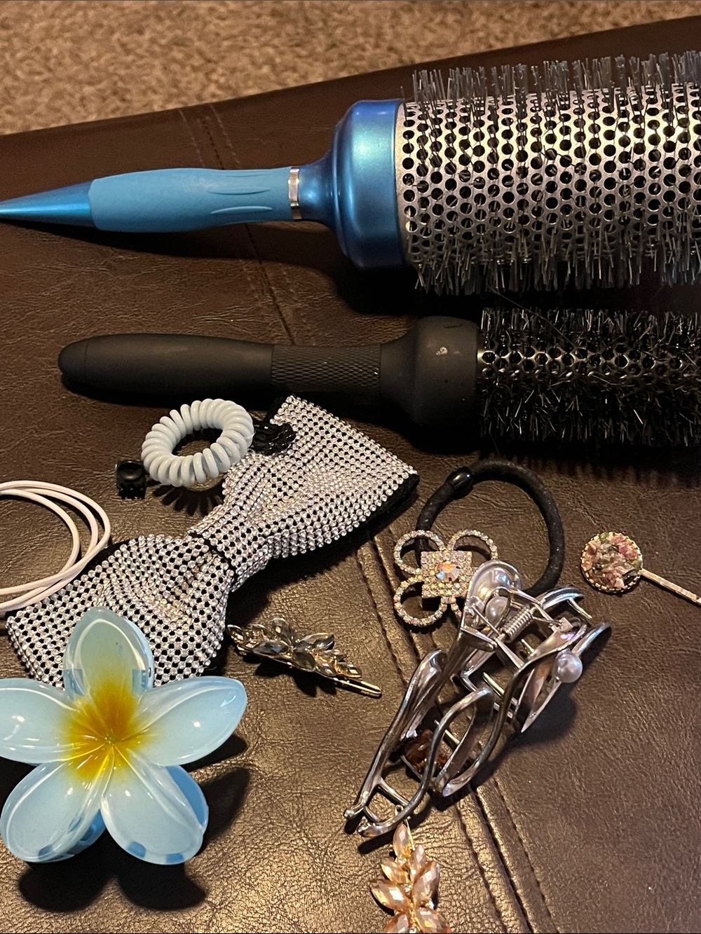 Bundle of hair accessories and brushes